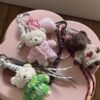 Grigri-marron-rose-vert-nounours-peluche-coeur