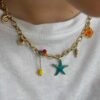 Collier-breloque-colore-etoile-mer-coquillage