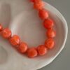 collier-colore-bonbon-rose-orange-blanc